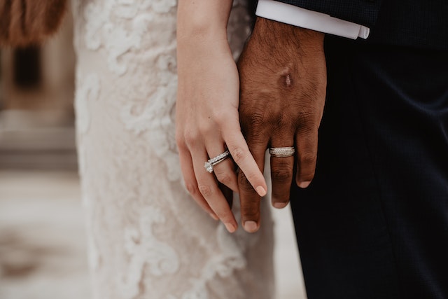 A Couple's Hands with Wedding Rings · Free Stock Photo